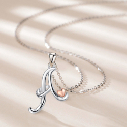Pendant Initial letters with a pink heart en sterling silver